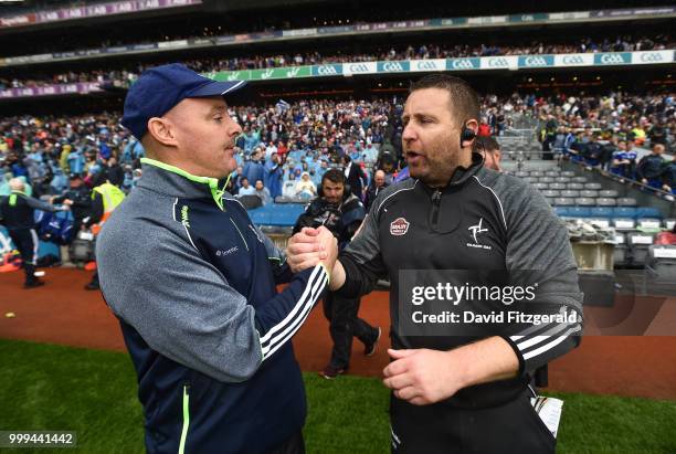 Dublin , Ireland - 15 July 2018; Monaghan manager Malachy O'Rourke, left, shakes hands with Kildare manager Cian O'Neill after the GAA Football...