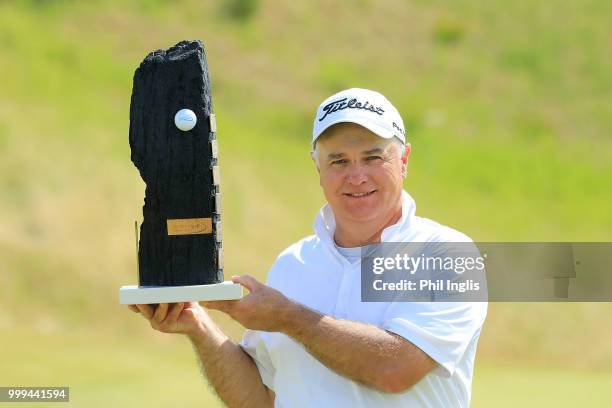 Stephen Dodd of Wales poses with the trophy after the final round on Day Three of the WINSTONgolf Senior Open at WINSTONlinks on July 15, 2018 in...