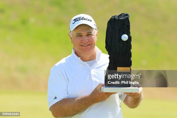 Stephen Dodd of Wales poses with the trophy after the final round on Day Three of the WINSTONgolf Senior Open at WINSTONlinks on July 15, 2018 in...