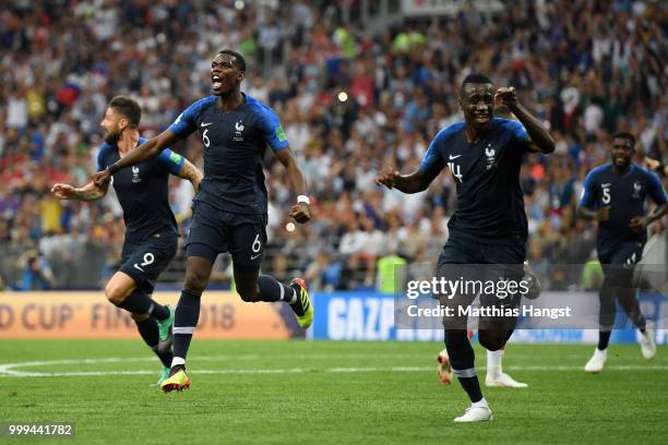 Paul Pogba and Blaise Matuidi of France celebrates after Mario Mandzukic of Croatia scores an own goal for France's first goal during the 2018 FIFA...