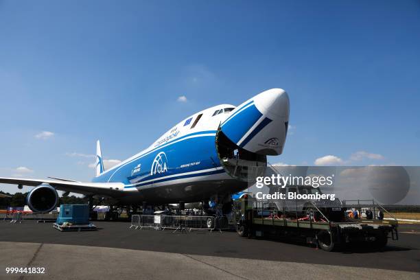 The nose cone of a Boeing Co. 747 cargo aircraft operated by CargoLogicAir Ltd. Lifts during a demonstration showing the loading of a Jeep, during...