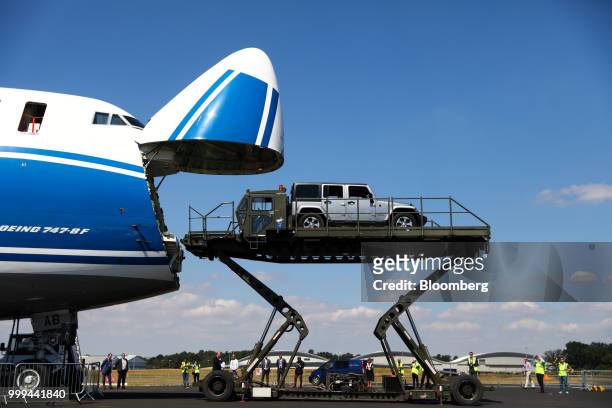 The nose cone of a Boeing Co. 747 cargo aircraft operated by CargoLogicAir Ltd. Lifts during a demonstration showing the loading of a Jeep during...