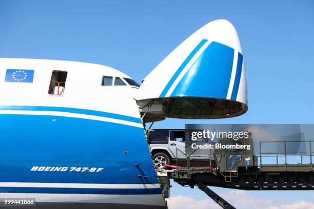 The nose cone of a Boeing Co. 747 cargo aircraft operated by CargoLogicAir Ltd. Lifts during a demonstration showing the loading of a Jeep during...