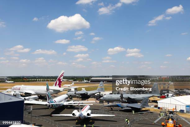 Range of passenger and military aircraft sit on display during preparations ahead of the Farnborough International Airshow 2018 in Farnborough, U.K.,...