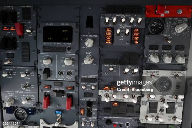 Instruments and controls sit in the cockpit of a Boeing Co. 737 Max 7 jetliner during preparations ahead of the Farnborough International Airshow...