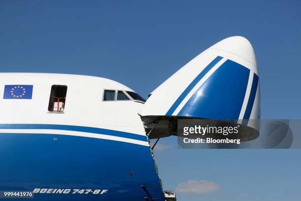 The nose cone of a Boeing Co. 747 cargo aircraft operated by CargoLogicAir Ltd. Lifts as part of a demonstration showing the loading of a Jeep during...