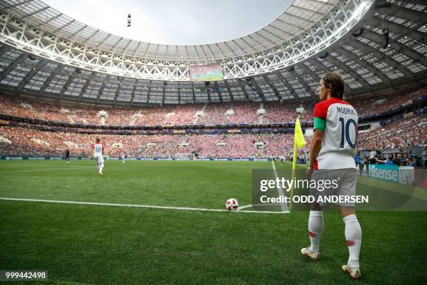 Croatia's midfielder Luka Modric takes a corner during the Russia 2018 World Cup final football match between France and Croatia at the Luzhniki...