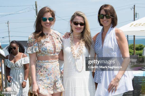 Delia Folk, Sarah Bray and Alison Bruhn attend the Modern Luxury + The Next Wave at Breakers Montauk on July 14, 2018 in Montauk, New York.