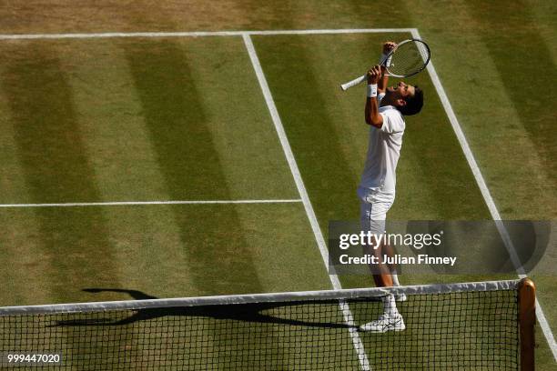 Novak Djokovic of Serbia celebrates Championship point against Kevin Anderson of South Africa during the Men's Singles final on day thirteen of the...