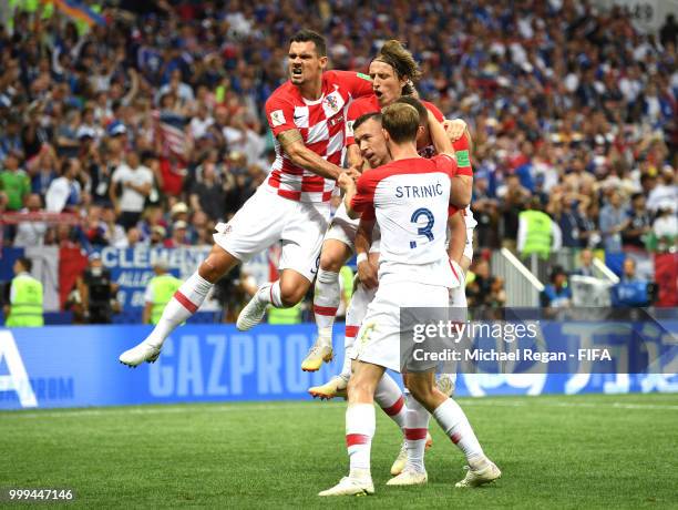 Ivan Perisic of Croatia celebrates with team mates after scoring his team's first goal during the 2018 FIFA World Cup Final between France and...
