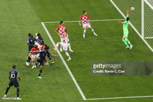 Mario Mandzukic of Croatia scores an own goal from Antoine Griezmann of France's free-kick, France's first goal during the 2018 FIFA World Cup Final...