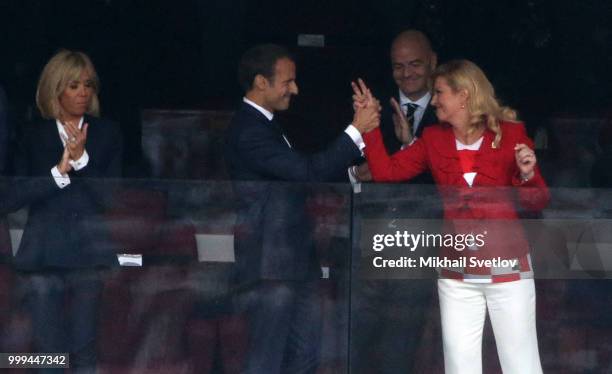 French President Emmanuel Macron , his wife Brigitte Macron , FIFA President Gianni Infantino , Croatian President Kolinda Grabar-Kitarovic watch the...