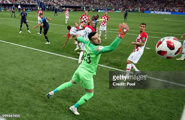 Mario Mandzukic of Croatia scores an own goal from Antoine Griezmann of France's free-kick for France's first goal during the 2018 FIFA World Cup...