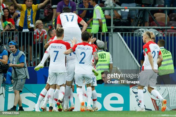Ivan Perisic of Croatia celebrates with teammates after scoring his team's first goal during the 2018 FIFA World Cup Russia Final between France and...