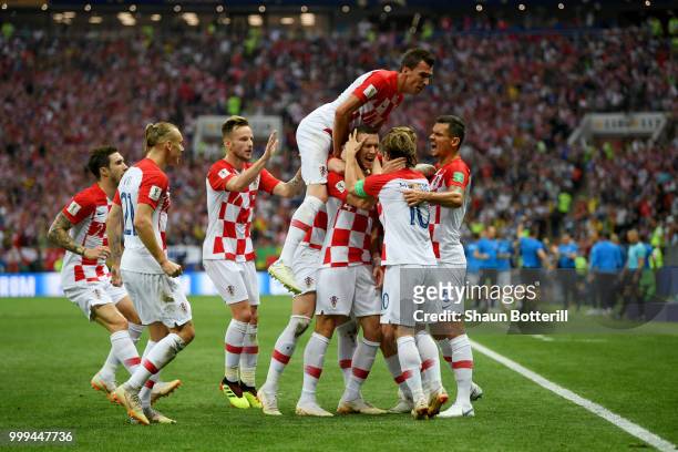 Ivan Perisic of Croatia celebrates with team mates after scoring his team's first goal during the 2018 FIFA World Cup Final between France and...