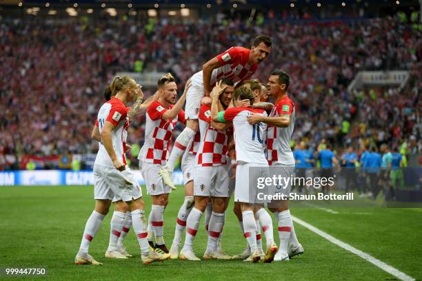 Ivan Perisic of Croatia celebrates with team mates after scoring his team's first goal during the 2018 FIFA World Cup Final between France and...