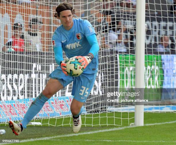 Augsburg goakeeper Marwin Hitz catching the ball during the Bundesliga match pitting FC Augsburg vs Borussia Monchengladbach in the WWK Arena in...