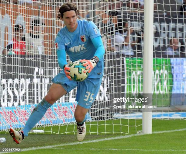 Augsburg goakeeper Marwin catching the ball during the Bundesliga match pitting FC Augsburg vs Borussia Monchengladbach in the WWK Arena in Augsburg,...