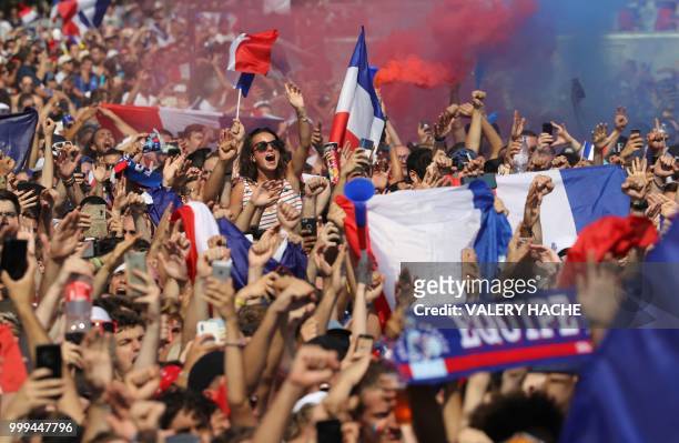 People gather to watch the Russia 2018 World Cup final football match between France and Croatia, on July 15, 2018 in the fan zone in Nice, on the...