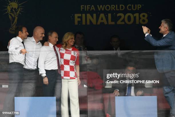 French President Emmanuel Macron, FIFA president Gianni Infantino, Russian President Vladimir Putin and Croatian President Kolinda Grabar-Kitarovic...