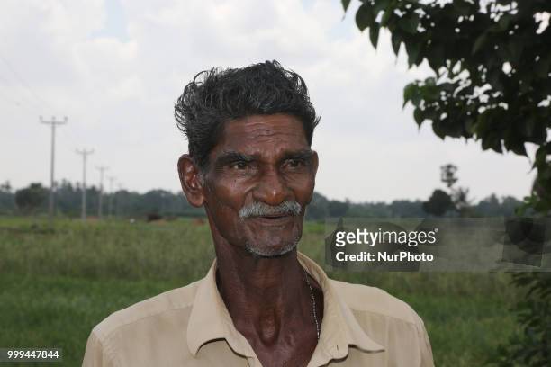 Tamil farmer in Jaffna, Sri Lanka. Many farmers toil for a good harvest which often fails to provide them enough income to support themselves and...