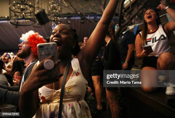 France fans celebrate at a French watch party at Liasion restaurant in Hollywood after France scored to put the team up 1-0 against Croatia in the...