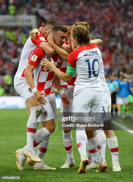 Ivan Perisic of Croatia celebrates with team mates after scoring his team's first goal during the 2018 FIFA World Cup Final between France and...