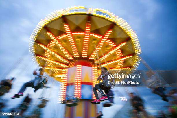 Carousel in Energylandia Amusement Park in Zator, Poland on 14 July, 2018. Energylandia is the largest amusement park in the country located in...