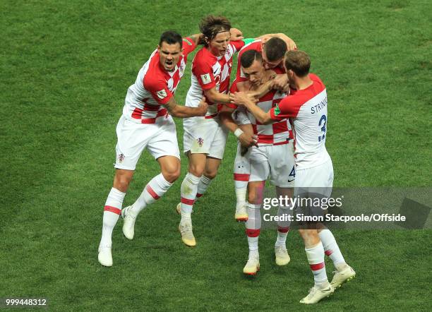 Dejan Lovren and Luka Modric of Croatia celebrate the equalising goal scored by Ivan Perisic of Croatia during the 2018 FIFA World Cup Russia Final...