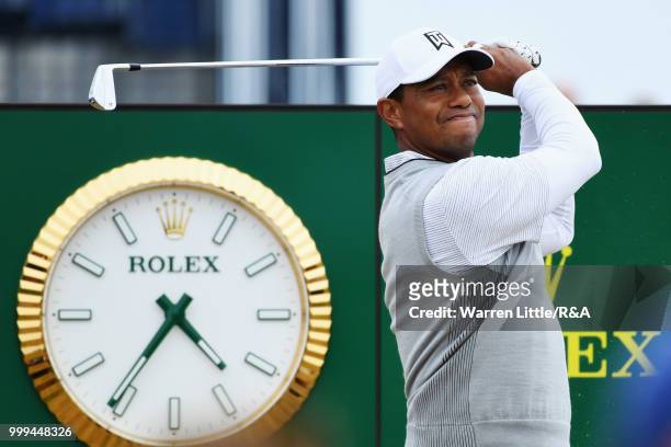 Tiger Woods of the United States tees off on the 4th hole while practicing during previews to the 147th Open Championship at Carnoustie Golf Club on...