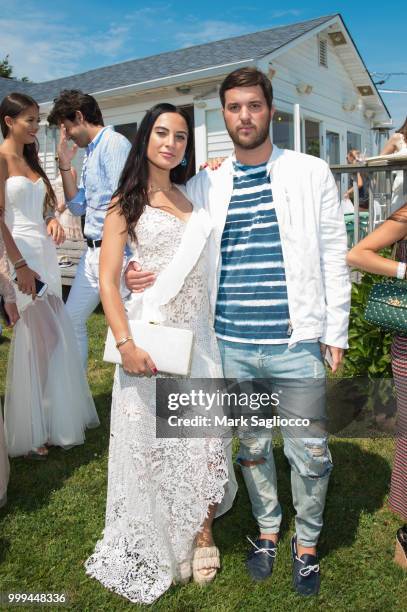 Danielle Naftali and Andrew Warren attend the Modern Luxury + The Next Wave at Breakers Montauk on July 14, 2018 in Montauk, New York.