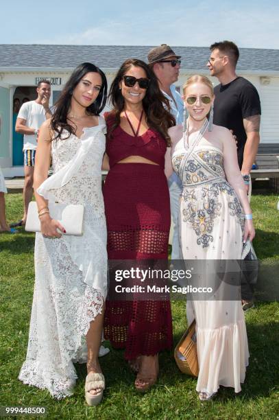 Danielle Naftali, Publisher Lynn Scotti and Sydney Sadick attend the Modern Luxury + The Next Wave at Breakers Montauk on July 14, 2018 in Montauk,...