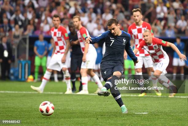 Antoine Griezmann of France scores his team's second goal from the penalty spot during the 2018 FIFA World Cup Final between France and Croatia at...