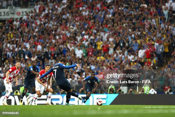 Antoine Griezmann of France scores his team's second goal from the penalty spot during the 2018 FIFA World Cup Final between France and Croatia at...