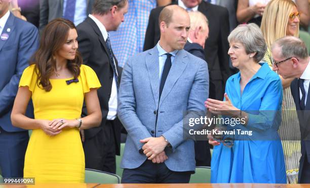 Catherine, Duchess of Cambridge, Prince William, Duke of Cambridge and Prime Minister Theresa May attend the men's singles final on day thirteen of...