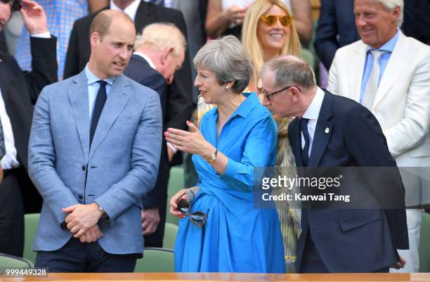 Prince William, Duke of Cambridge, Prime Minister Theresa May and Philip May attend the men's singles final on day thirteen of the Wimbledon Tennis...