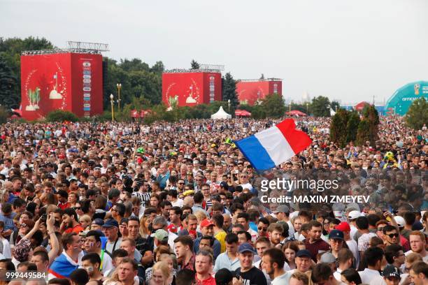 Supporters gather to watch on a giant screen the final match between France and Croatia at the fan Fest in Moscow before the Russia 2018 World Cup...