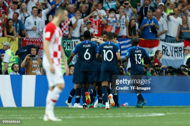Antoine Griezmann of France celebrates with teammates after scoring a penalty for his team's second goal during the 2018 FIFA World Cup Russia Final...