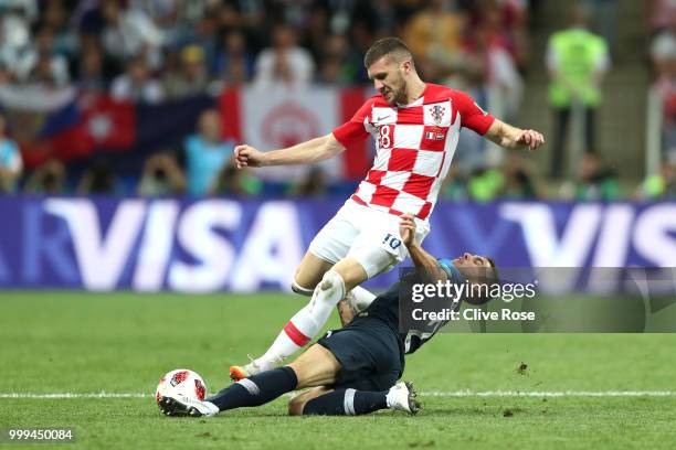 Lucas Hernandez of France tackles Ante Rebic of Croatia during the 2018 FIFA World Cup Final between France and Croatia at Luzhniki Stadium on July...