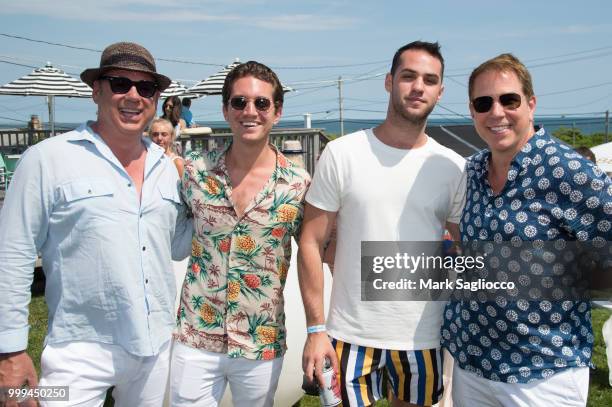 Salvatore Piazzolla, Eric Goldie, Brandon Kops attend the Modern Luxury + The Next Wave at Breakers Montauk on July 14, 2018 in Montauk, New York.