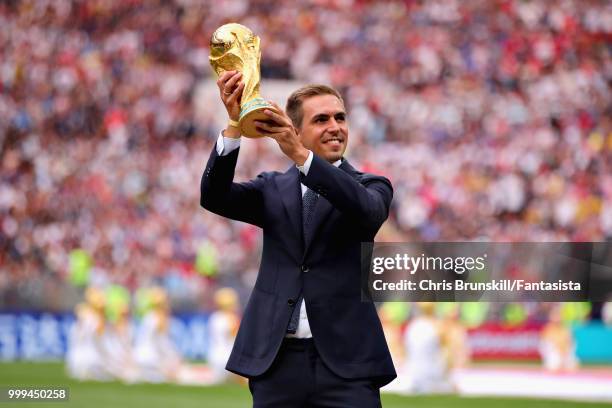 World Cup winner Philipp Lahm of Germany is seen with the World Cup trophy before the 2018 FIFA World Cup Russia Final between France and Croatia at...