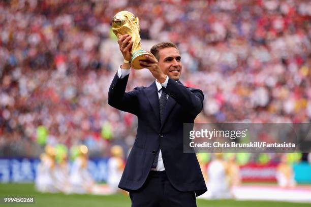 World Cup winner Philipp Lahm of Germany is seen with the World Cup trophy before the 2018 FIFA World Cup Russia Final between France and Croatia at...