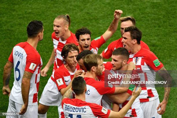 Croatia's forward Ivan Perisic celebrates with teammates after scoring a goal during the Russia 2018 World Cup final football match between France...