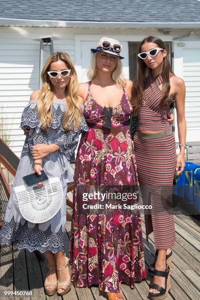 Marisa Hochberg, Anna Kassar and Barbie Georgiadis attend the Modern Luxury + The Next Wave at Breakers Montauk on July 14, 2018 in Montauk, New York.