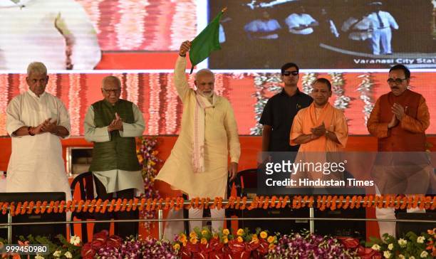 Prime Minister Narendra Modi with Uttar Pradesh Governor Ram Naik, and Chief Minister Yogi Adityanath, Uttar Pradesh Deputy Chief Minister Keshav...