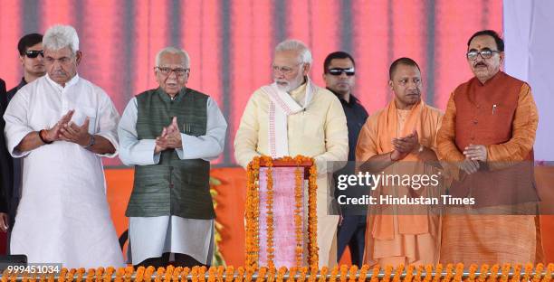 Prime Minister Narendra Modi with Uttar Pradesh Governor Ram Naik, and Chief Minister Yogi Adityanath, Uttar Pradesh Deputy Chief Minister Keshav...