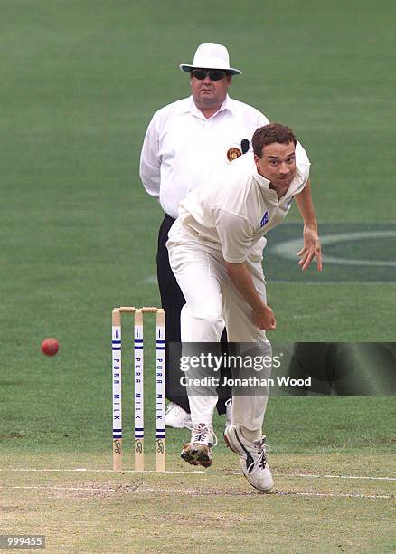 Stuart Clark of New South Wales in action during the second day of play in the Pura Cup Match between the Queensland Bulls and the New South Wales...