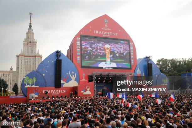 Giant screen shows the final match between France and Croatia at the fan Fest in Moscow before the Russia 2018 World Cup final football tournament on...