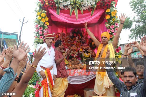 People participate in a Rath Yatra of Lord Jagannath, on July 14, 2018 in Mumbai, India. The festival marks the journey of Lord Jagannath, Lord...