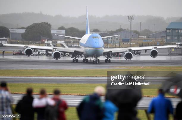 President, Donald Trump and First Lady, Melania Trump depart from Glasgow Prestwick Airport aboard Air Force One, following the U.S. President's...